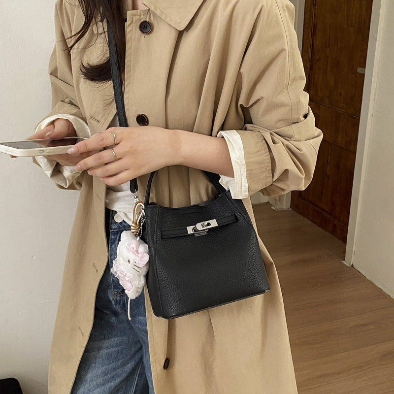 Women's mini handbag with cute charm
