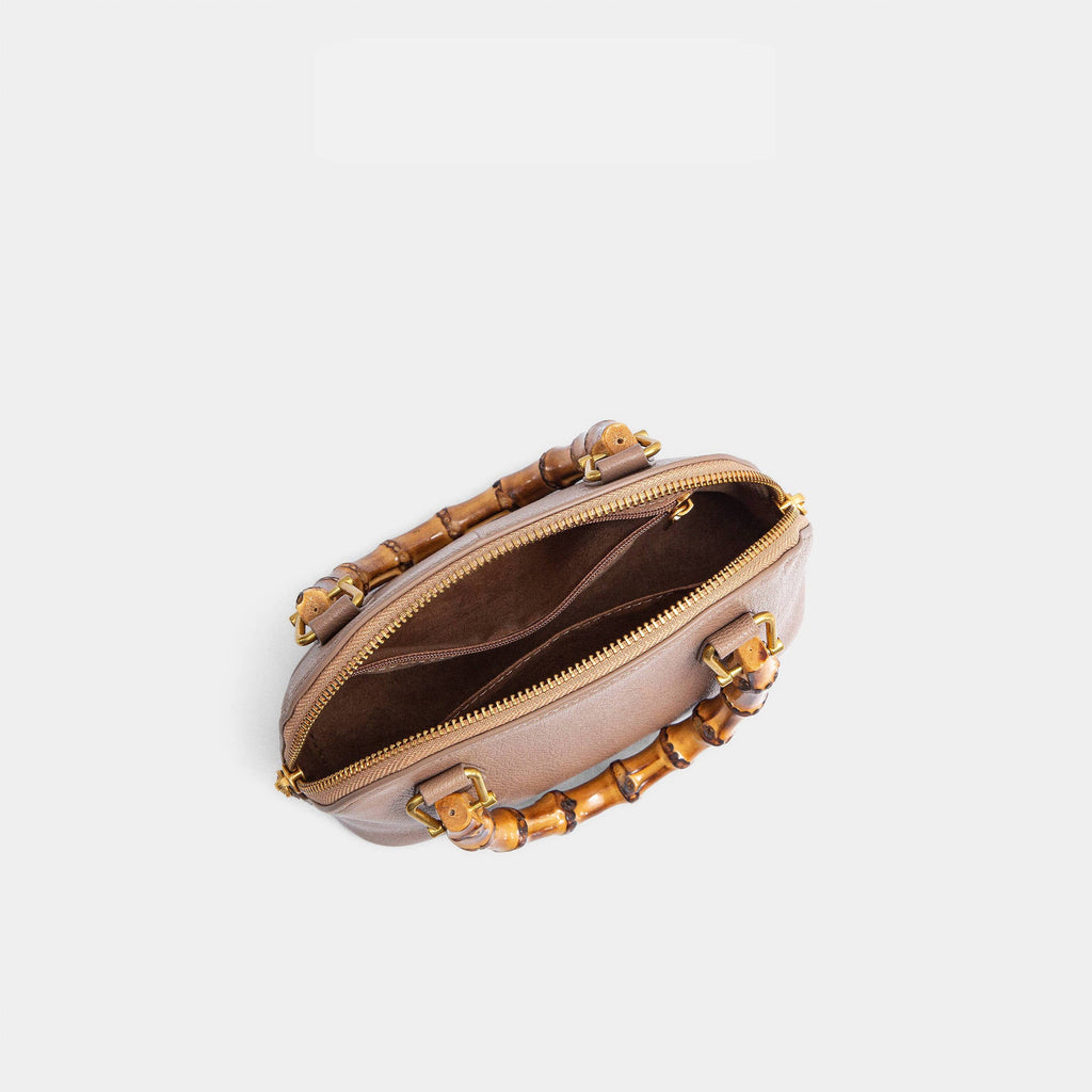 Ladies fashionable mini bag with bamboo handle and elegant leather