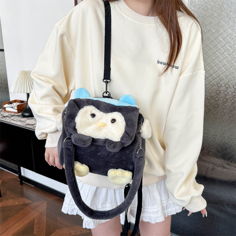 Plush backpack with cute penguin design