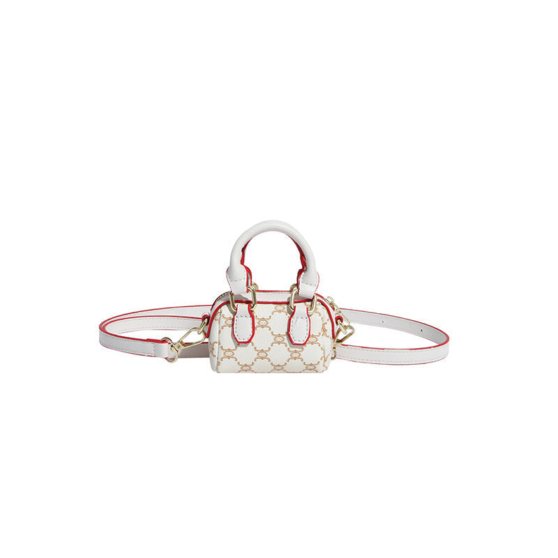 Ladies mini handbag with luxurious accents and adjustable shoulder strap