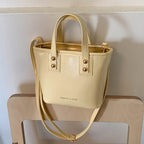 Women's mini bag with elegant structure and practical carrying handle