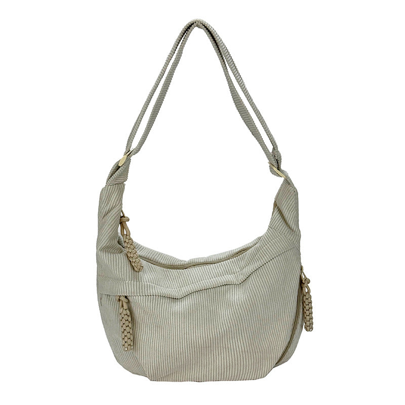 Shoulder bag with artistic fan design