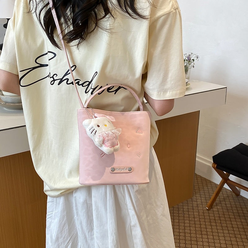 Women's mini bag with playful character