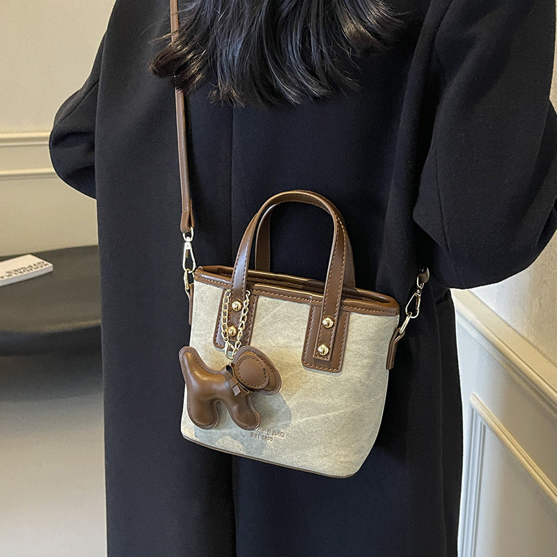 Women's mini handbag with removable charm