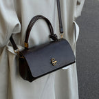 Women's elegant handbag with detachable shoulder strap