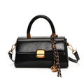 Women's elegant handbag with golden accents