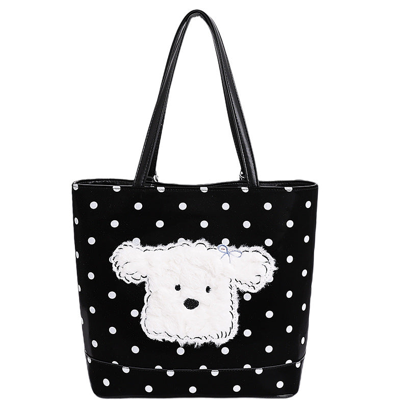 Plush shoulder bag with playful dog motif