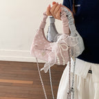 Women's mini handbag with decorative accents