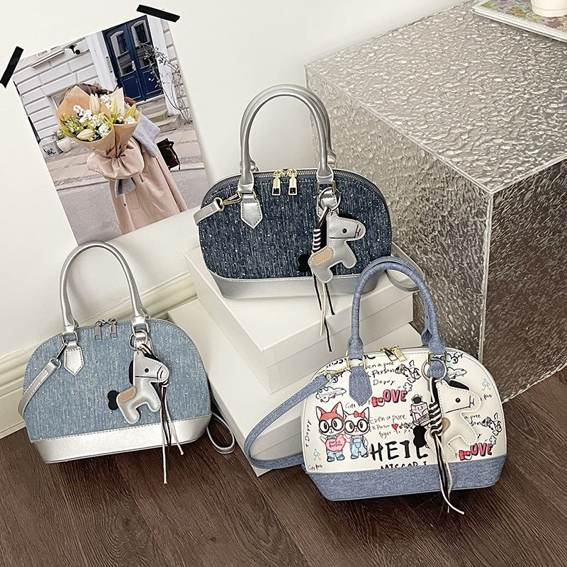 Women's mini handbag with animal charm and fashionable denim