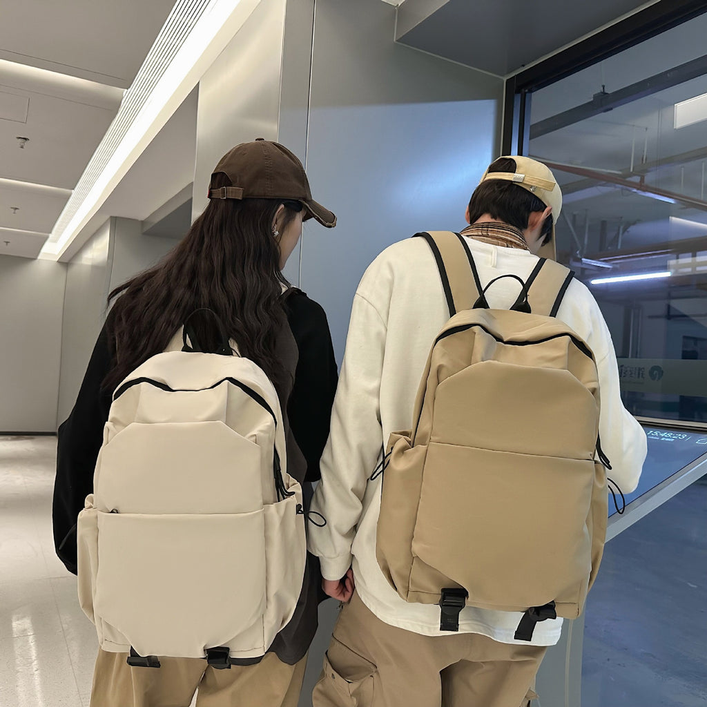 Everyday backpack with ergonomic carrying system and multifunctional pockets