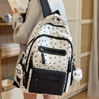 Backpack with Charming Star Applications and Practical Compartments