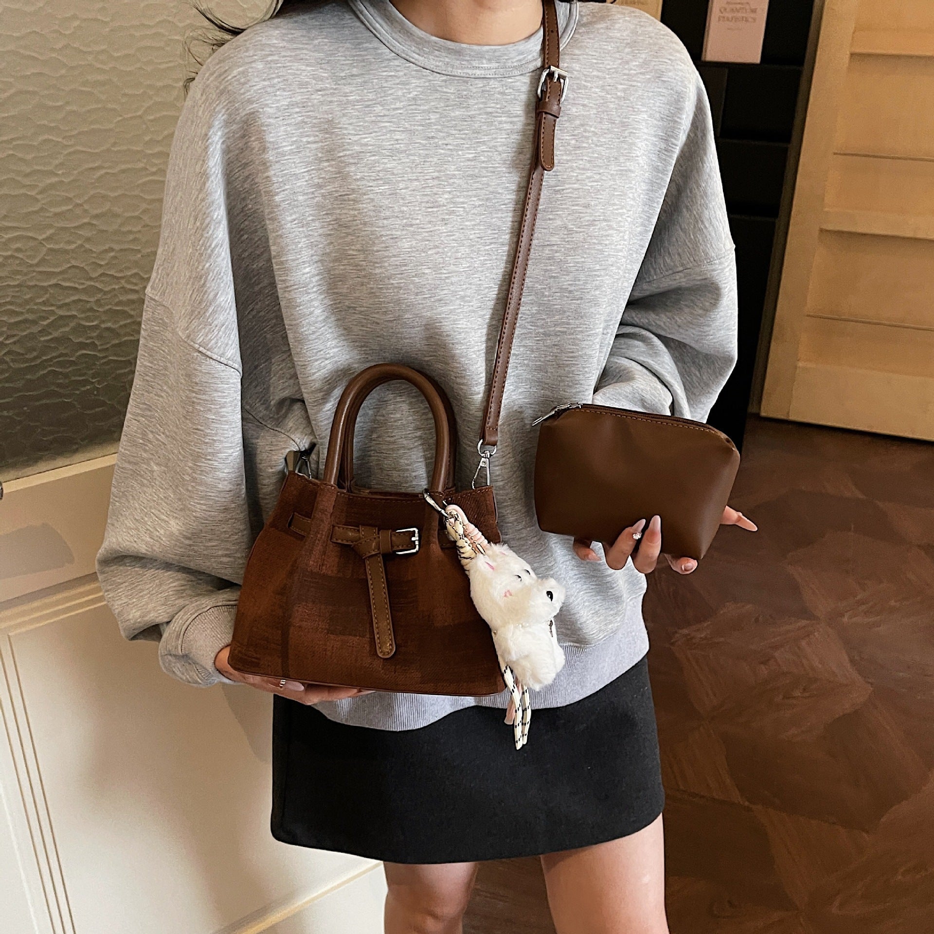 Women’s mini handbag with modern accents and practical interior organizer