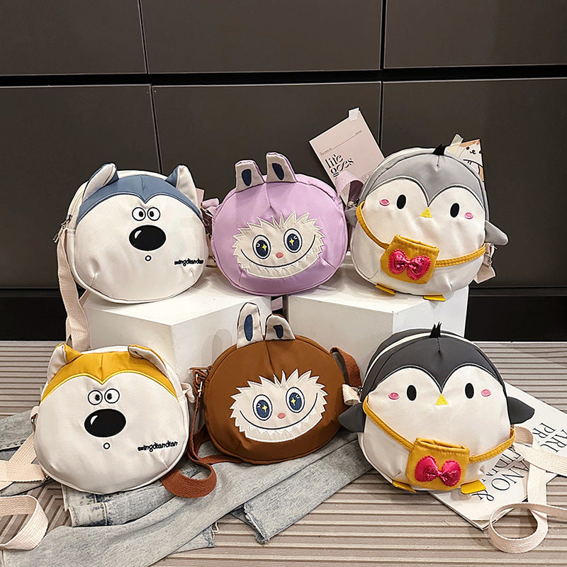 Plush children's backpack in cute penguin design