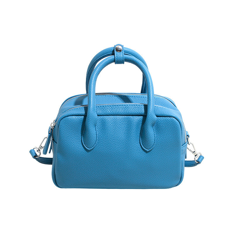 Women’s mini handbag with textured artificial leather and elegant design
