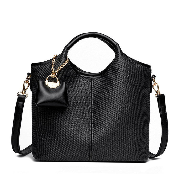 Ladies elegant handbag with textured design and removable mini organizer