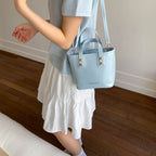 Women’s mini handbag with elegant chain closure