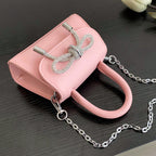 Women’s mini handbag with elegant chain closure