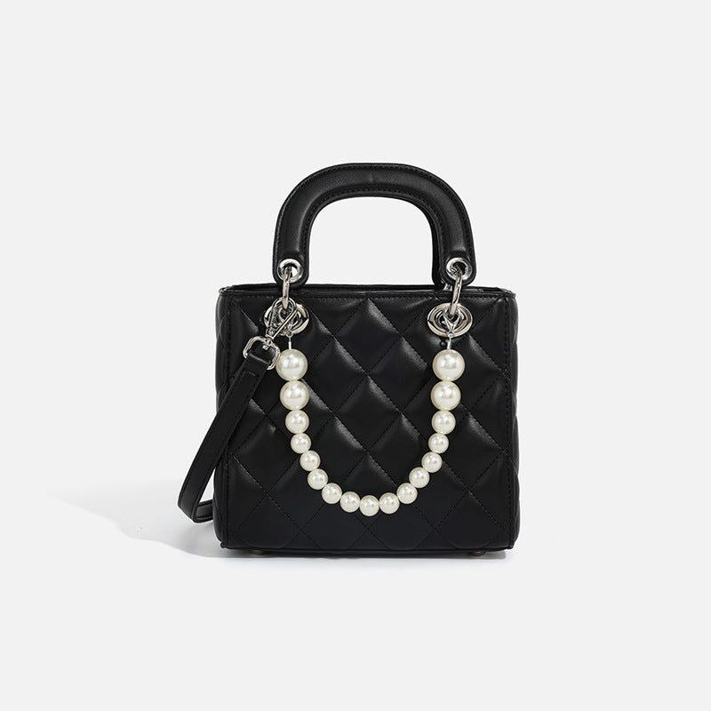 Ladies mini handbag with pearl-embellished chain and quilted design