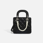 Ladies mini handbag with pearl-embellished chain and quilted design