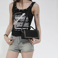 Women's mini handbag with sparkling upper material and golden studs