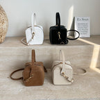 Ladies mini handbag with removable shoulder strap and elegant flap closure