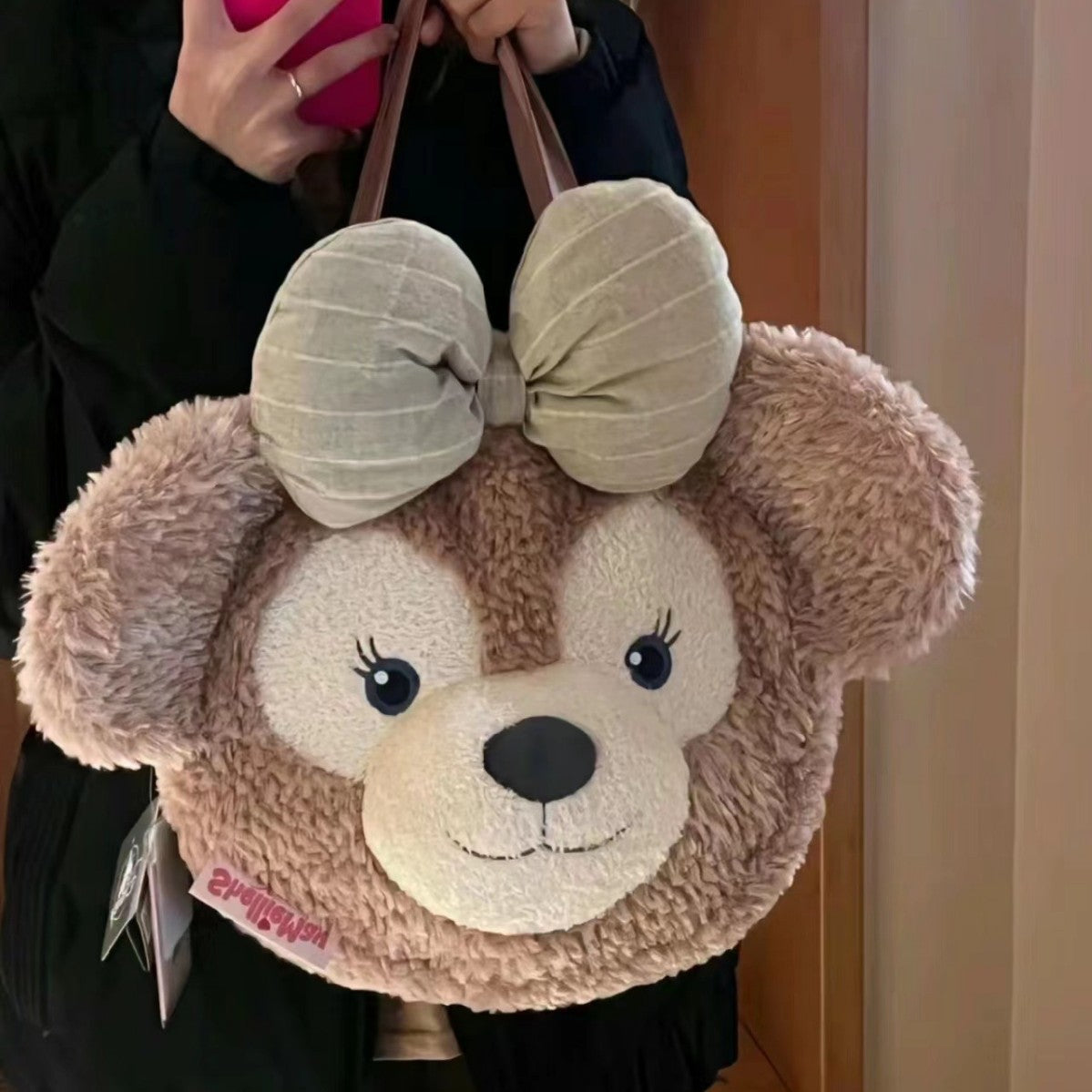 Plush handbag with bear head design