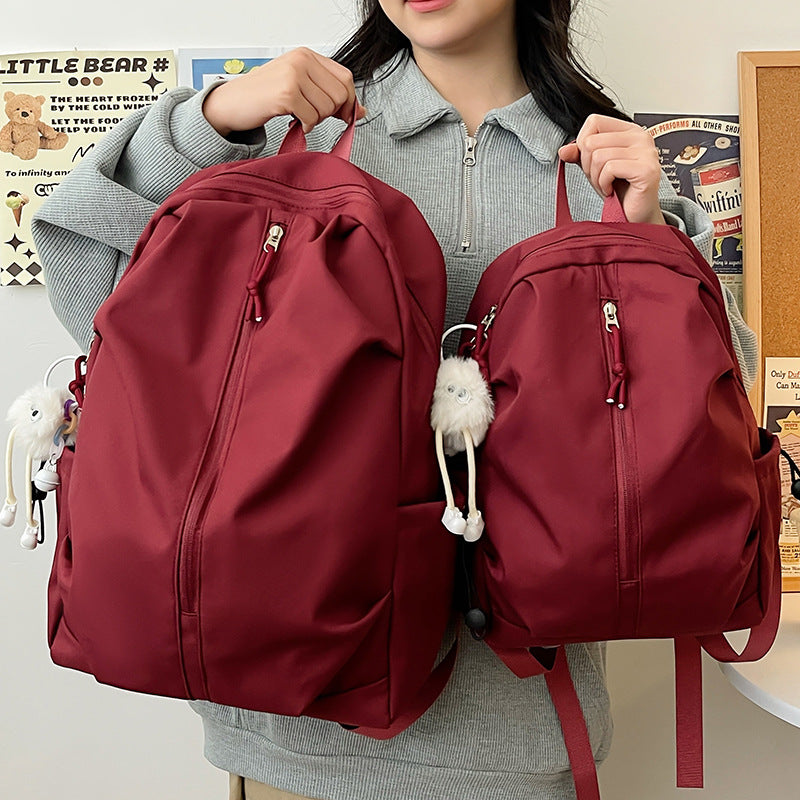 Lightweight urban backpack with multifunctional side pockets