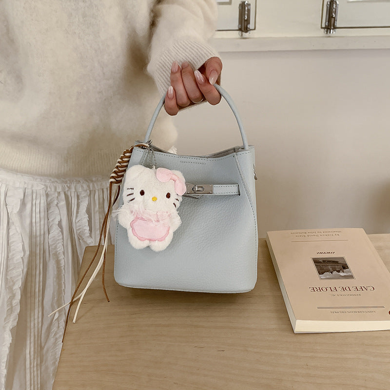 Women’s mini bag with detachable plush pendant