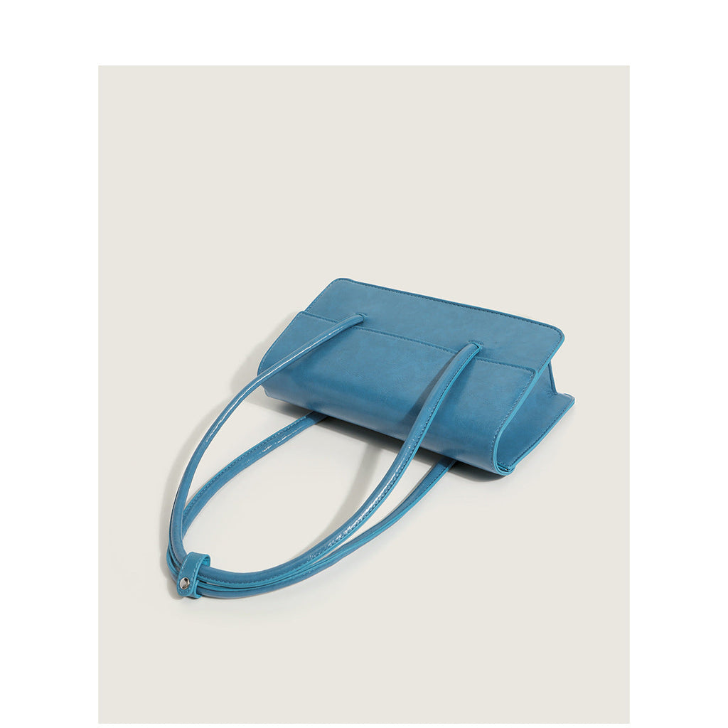 Ladies elegant handbag with minimalist silhouette