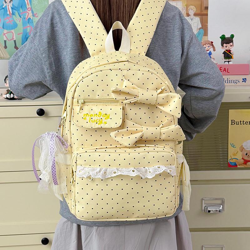 Backpack with Playful Bows and Practical Storage Solutions