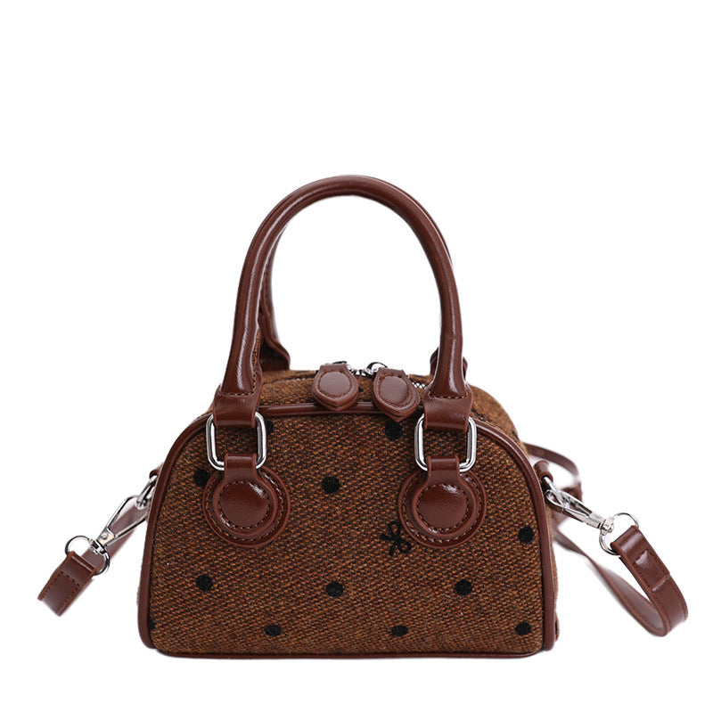 Women’s mini handbag made of high-quality material with a textured surface