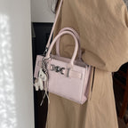Women's handbag in modern minimalist style with playful charm