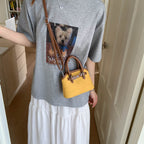 Women's mini bag with adjustable shoulder strap
