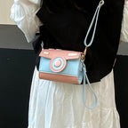Women’s mini handbag with playful flap closure