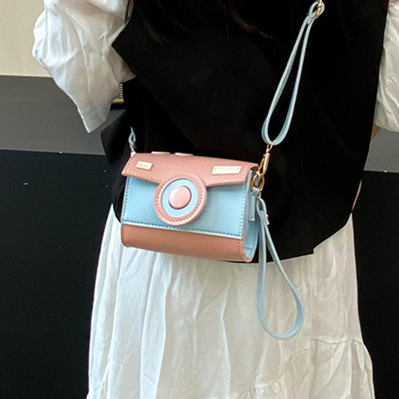 Women’s mini handbag with playful flap closure