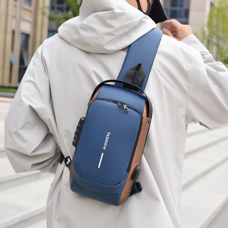 Shoulder bag with ergonomic design and multiple compartments