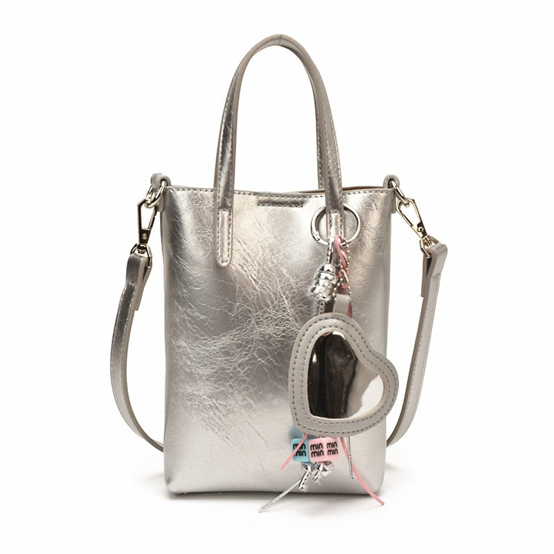 Ladies mini handbag with elegant pendant