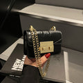 Women's mini handbag with elegant metal accents