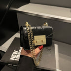 Women's mini handbag with elegant metal accents