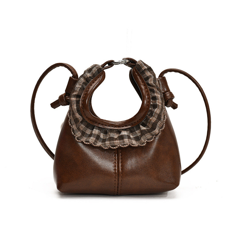 Women’s mini handbag with trendy ruffle design