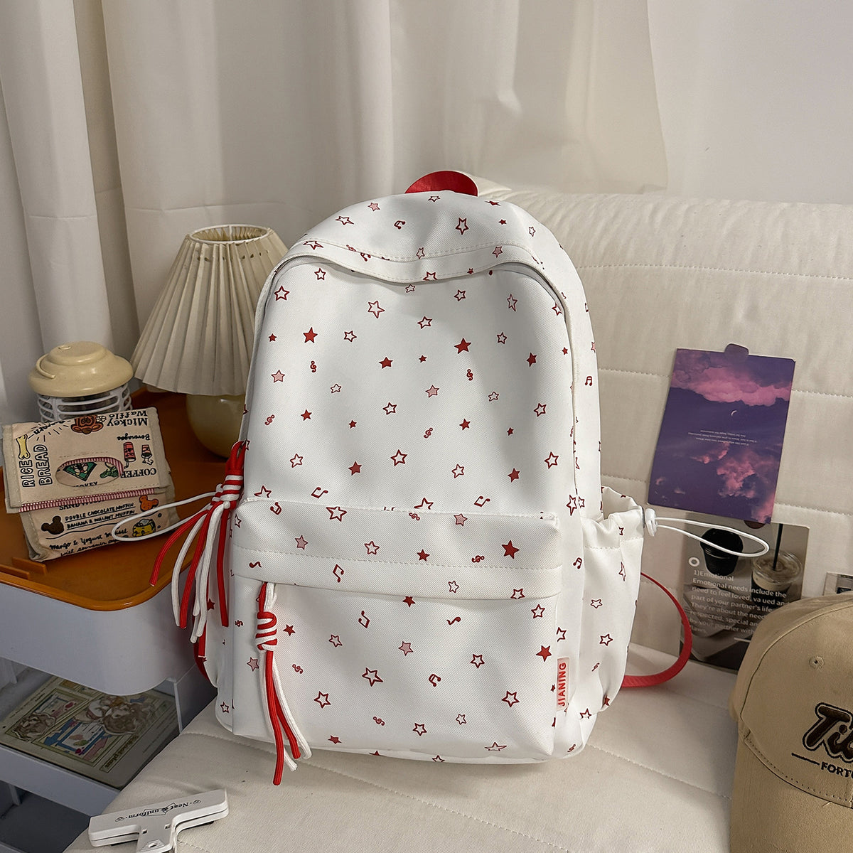 Fashionable backpack with colorful star pattern
