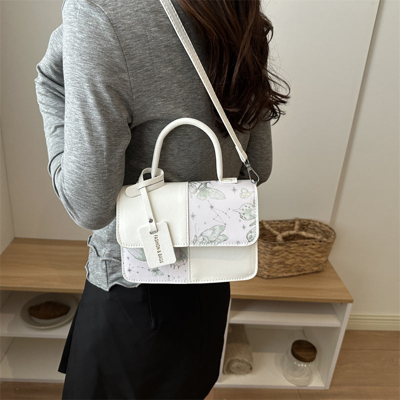 Ladies elegant mini handbag with floral design