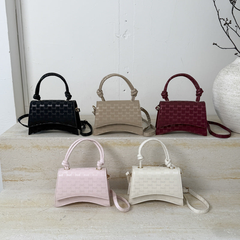 Ladies Mini-Handbag with sophisticated logo design