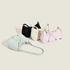 Ladies elegant mini handbag with playful drawstring