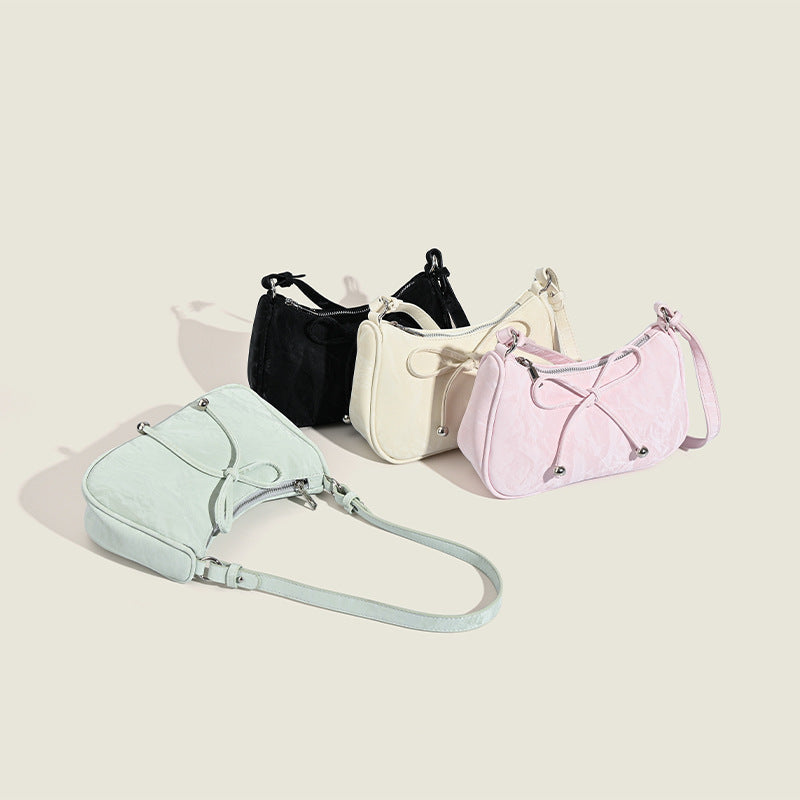 Ladies elegant mini handbag with playful drawstring