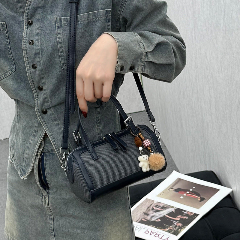 Women's mini bag with playful charm