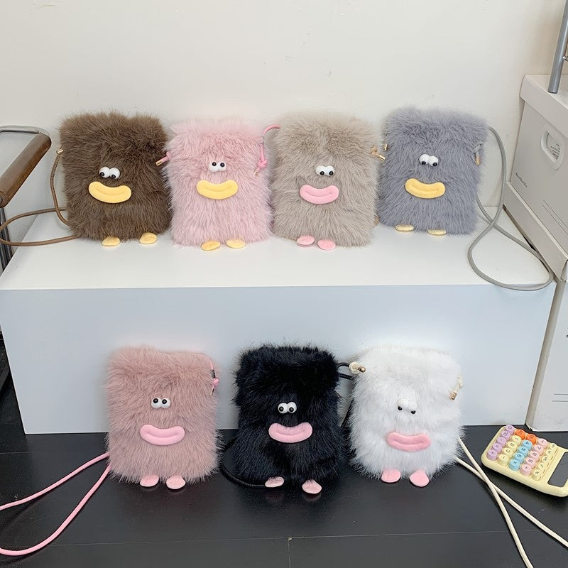 Plush shoulder bag with unique character design