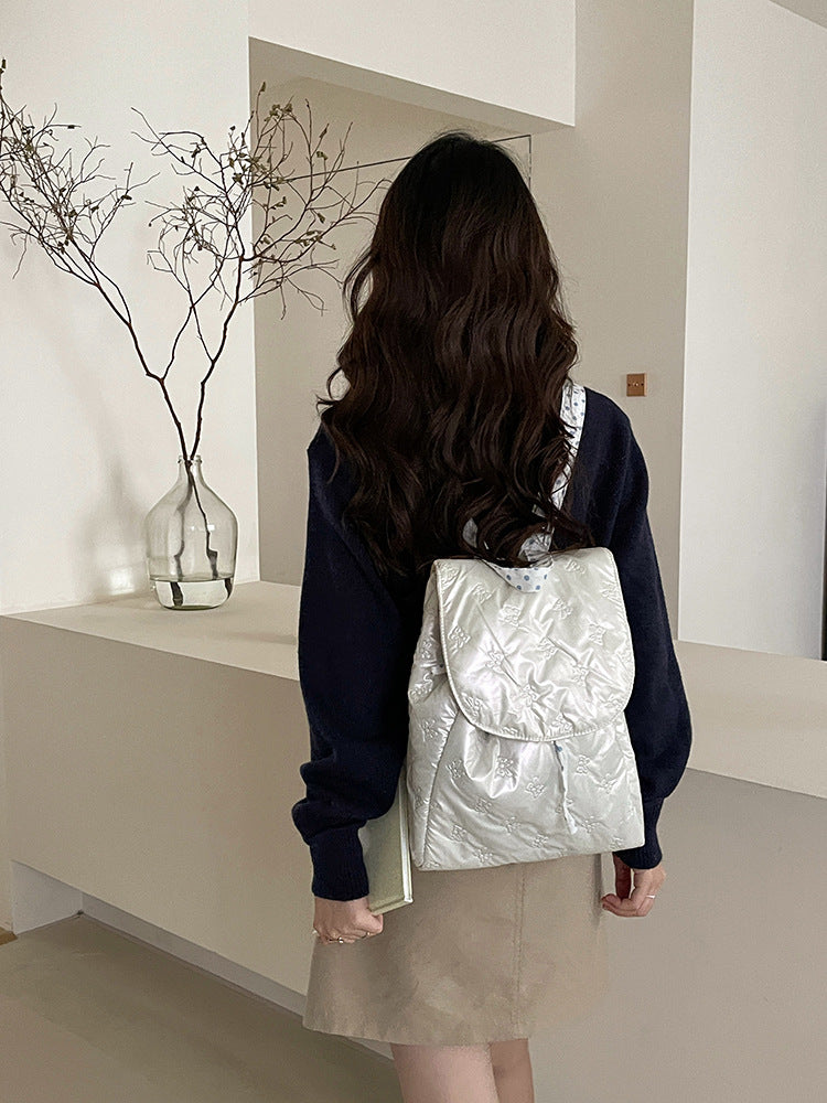 Backpack with velvet-soft upper material and elegant flap closure