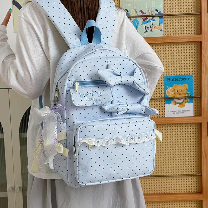 Backpack with Playful Bows and Practical Storage Solutions