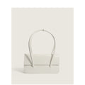 Ladies elegant handbag with minimalist silhouette